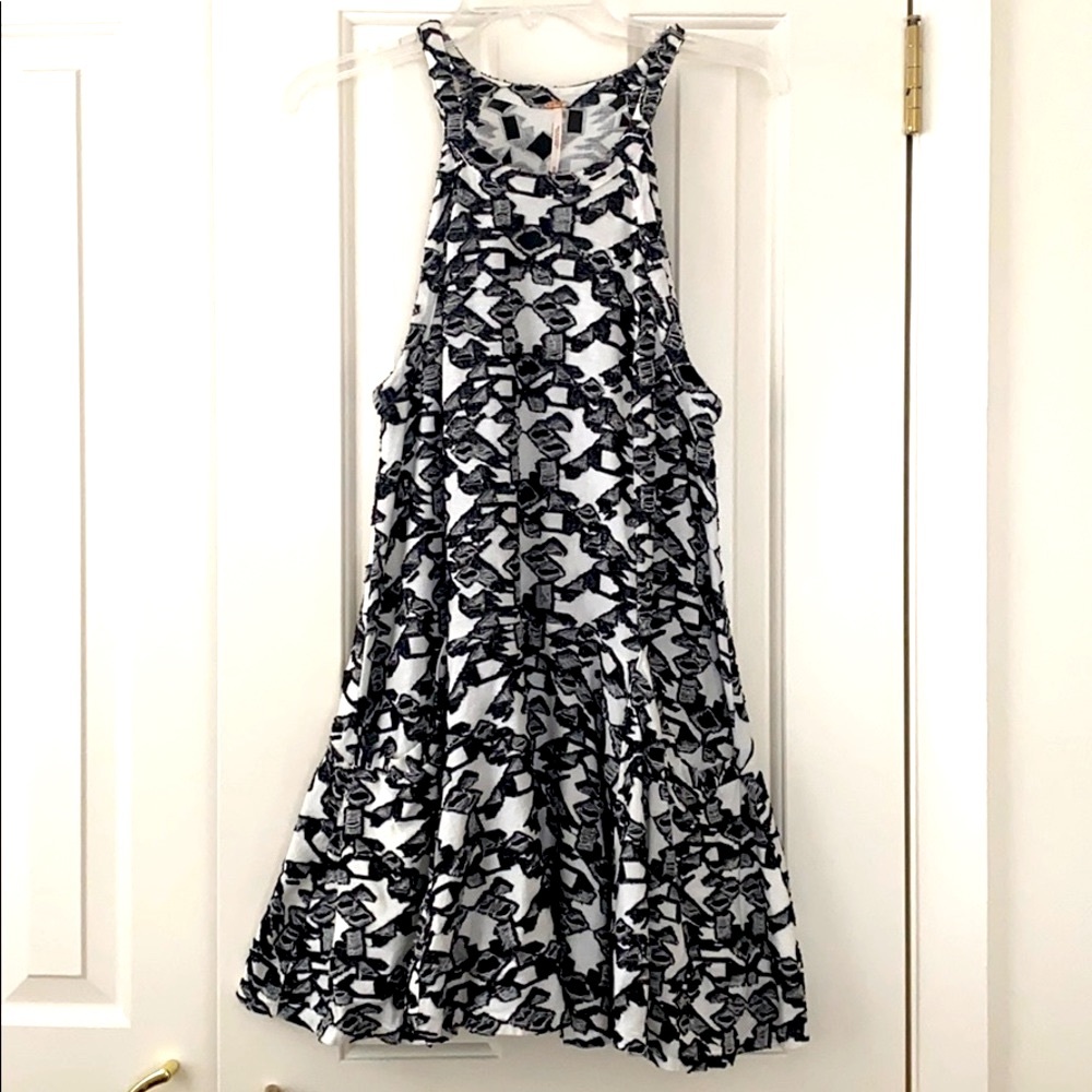 FLARE DRESS, slash pockets. 32”L New condition
